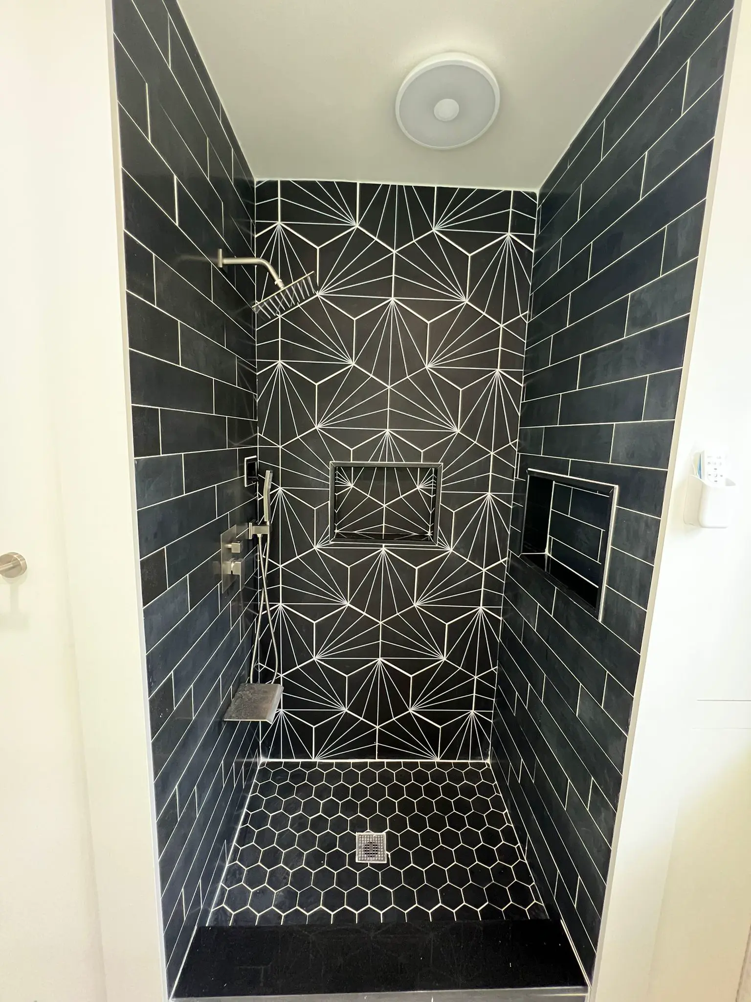 Completed bathroom remodeling project by Titan Forge Construction